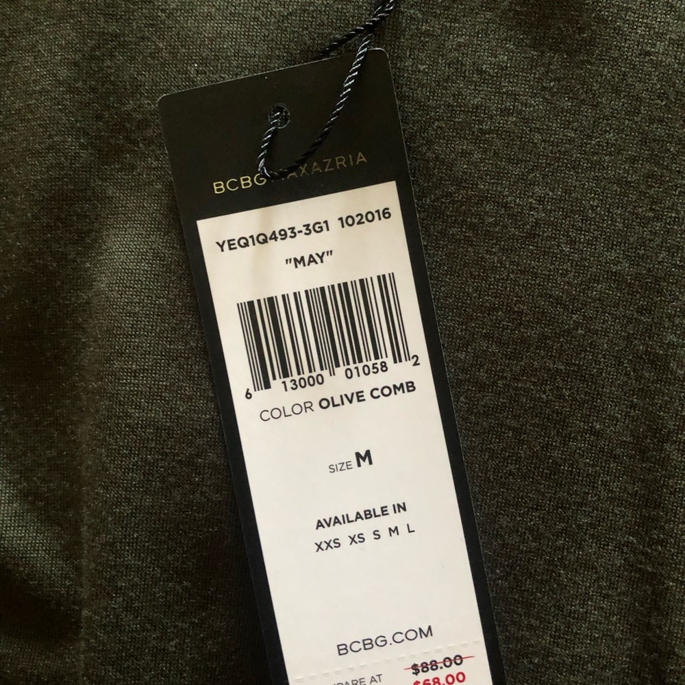 BCBG woman’s tunic top.  Never worn.